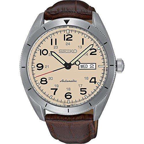 Men's analog wristwatch with cream dial, silver case, brown leather strap, day/date window.