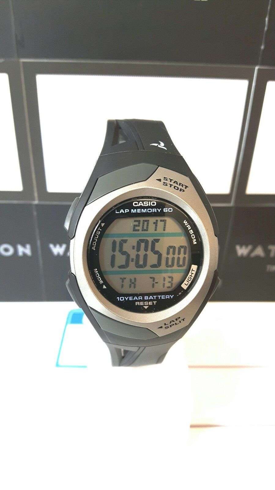Men's digital sports watch, black resin strap, circular LCD screen with yellow digits