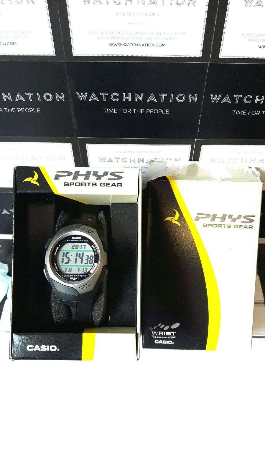 Casio men's digital sports watch in retail box with black resin strap and LCD display