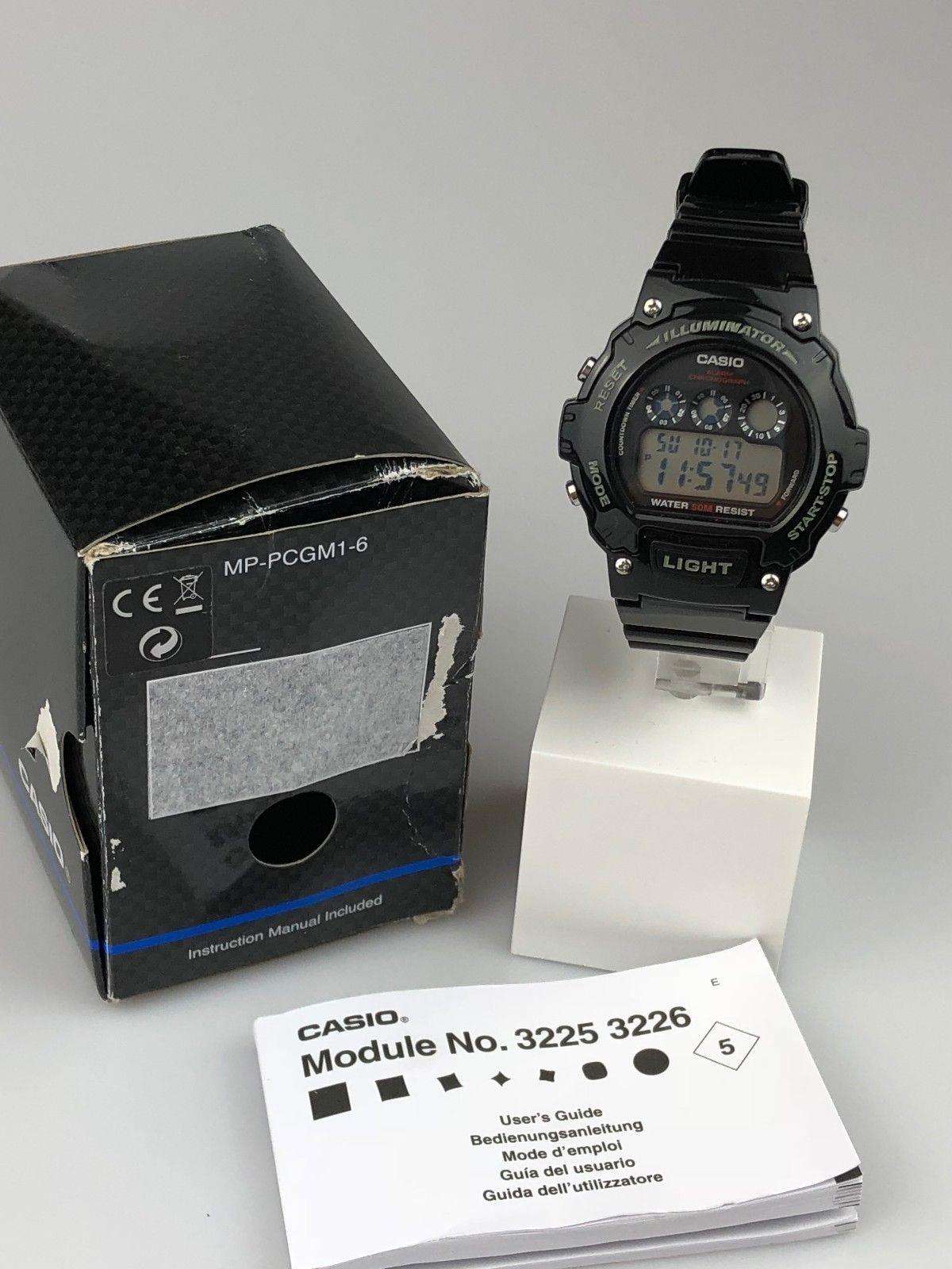 Casio men’s digital sport alarm chronograph watch shown with product box and manual