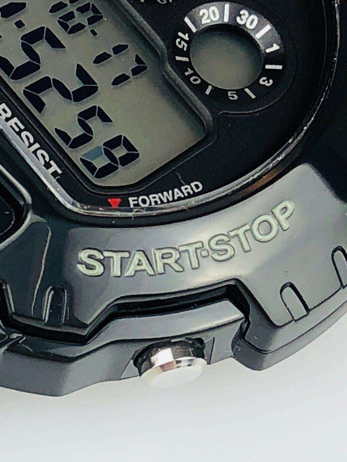 Casio sport watch close-up showing “START/STOP” text and forward button