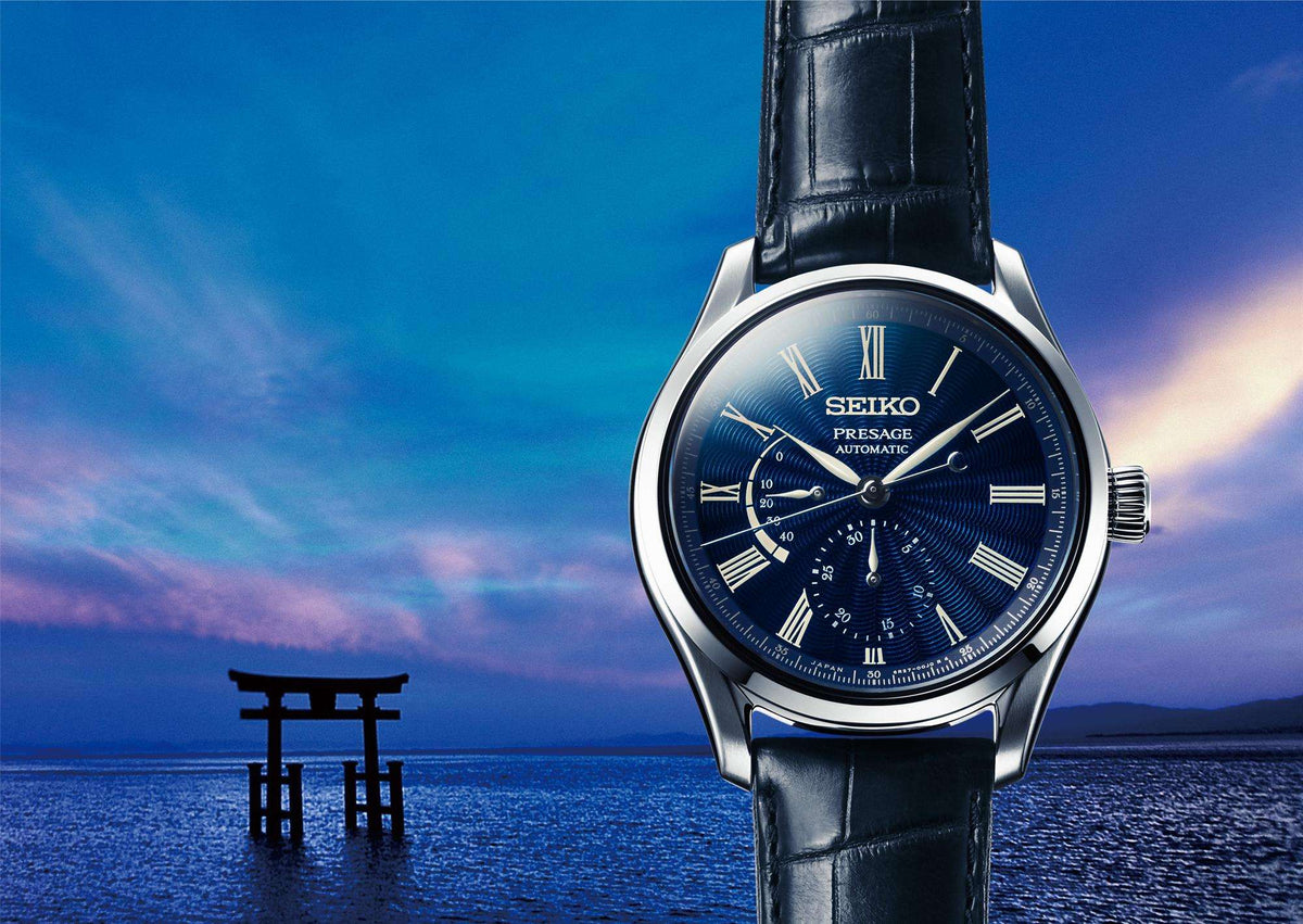 Seiko Presage automatic watch with blue dial, stainless case, and blue leather strap, side view