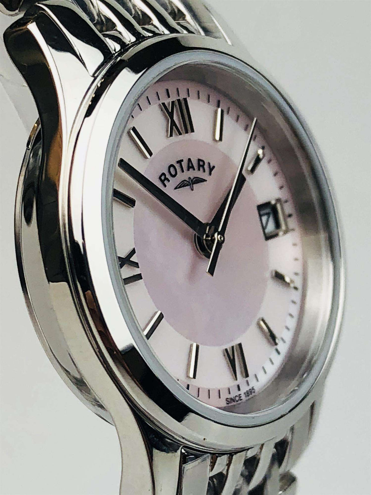 Stainless steel ladies watch with mother-of-pearl dial, Roman numerals, and slim bracelet