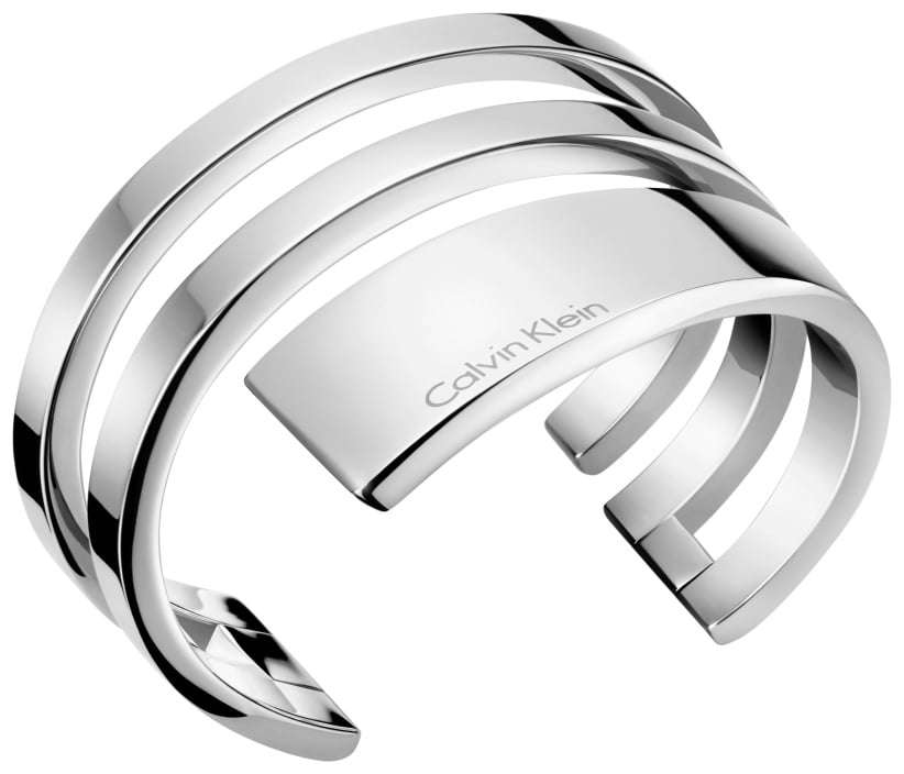 Silver stainless steel open cuff bangle with Calvin Klein logo on inner band