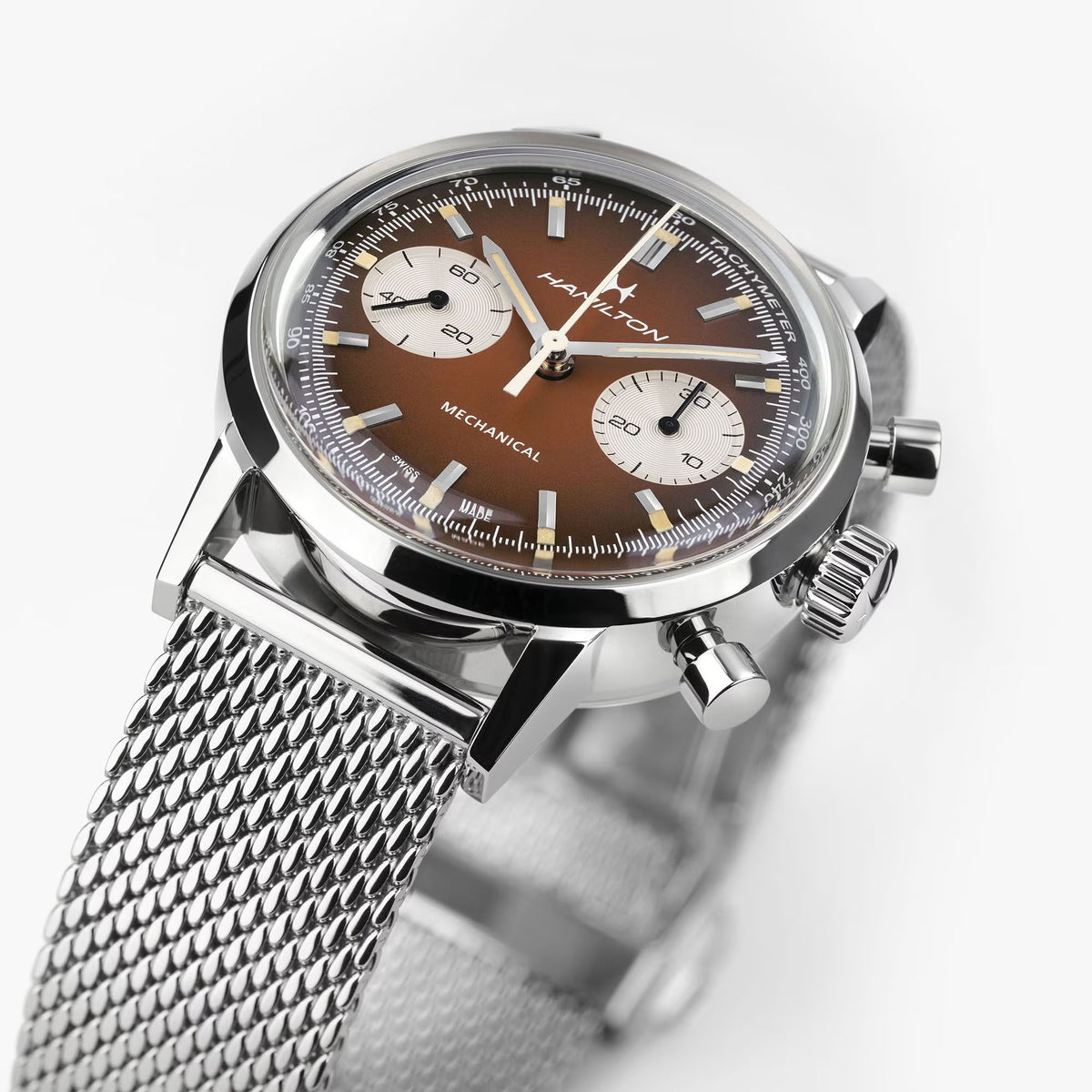Hamilton 40mm chronograph watch close-up, brown dial with subdials, silver case and mesh band