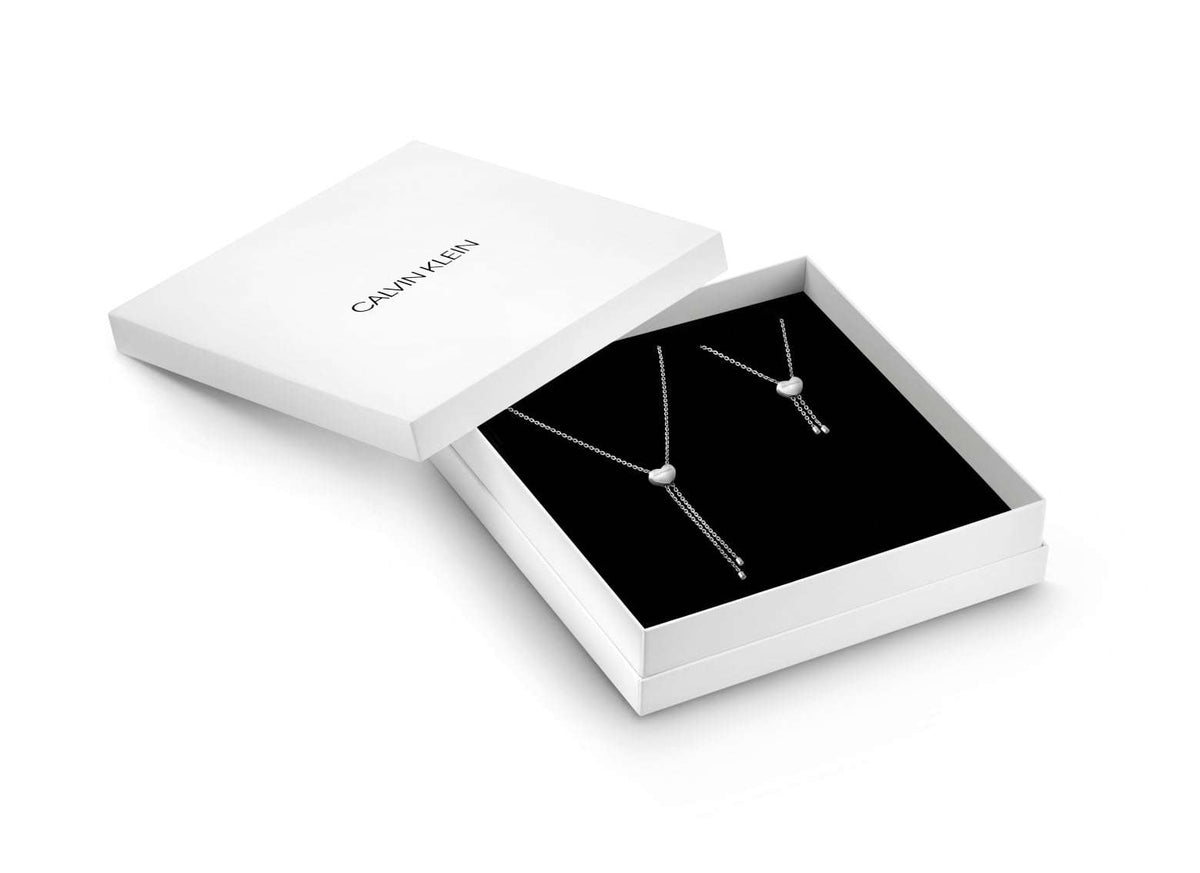 Calvin Klein heart pendant necklace and bracelet set, silver-tone linked hearts