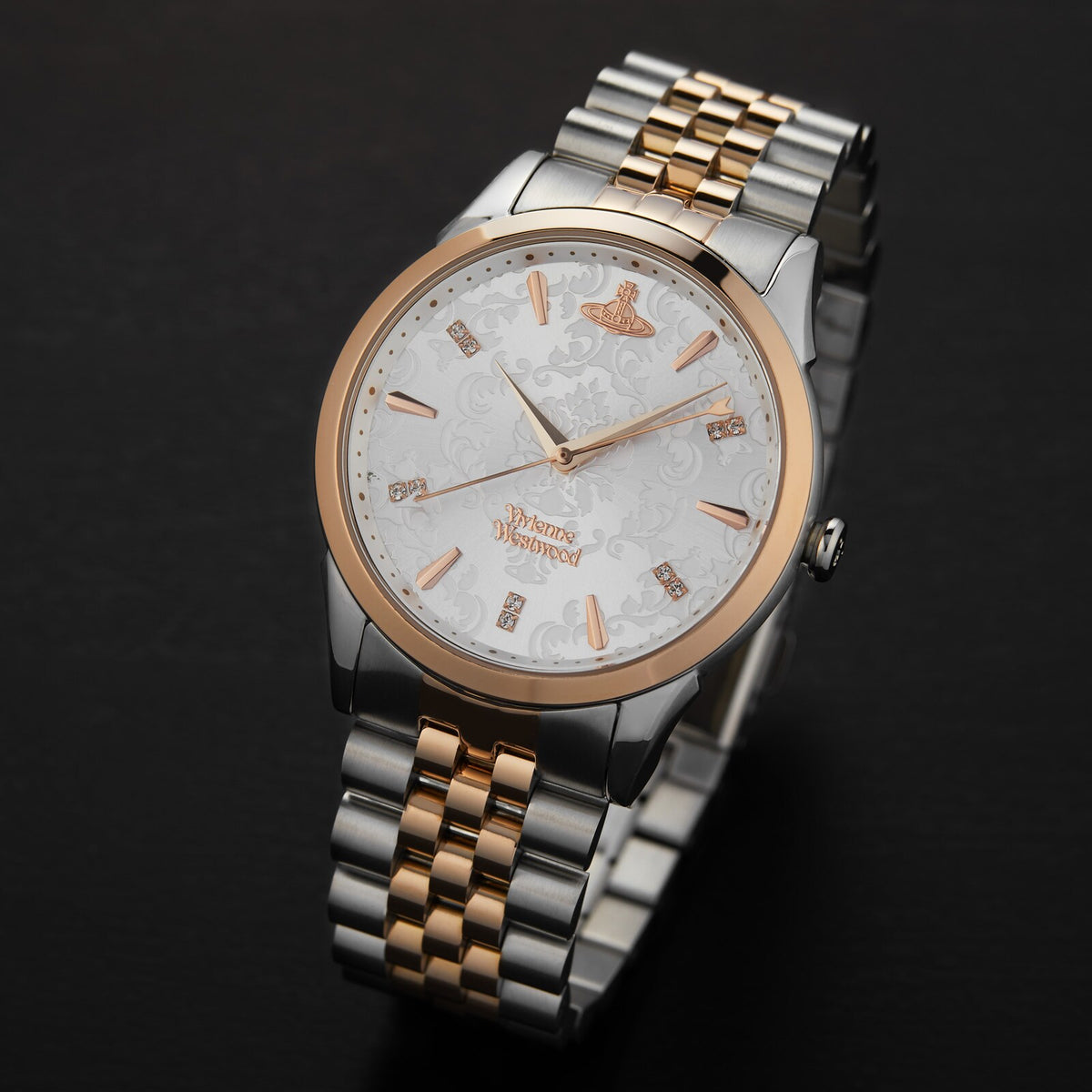 Two-tone stainless steel women’s quartz watch with rose-gold bezel and white dial