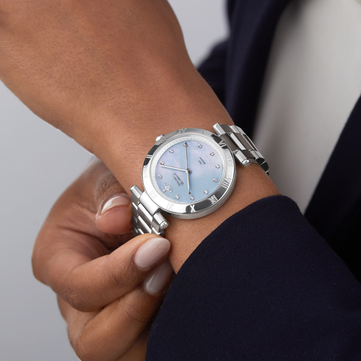 Vivienne Westwood Montagu VV206BLSL women's watch worn on wrist showing blue mother of pearl dial