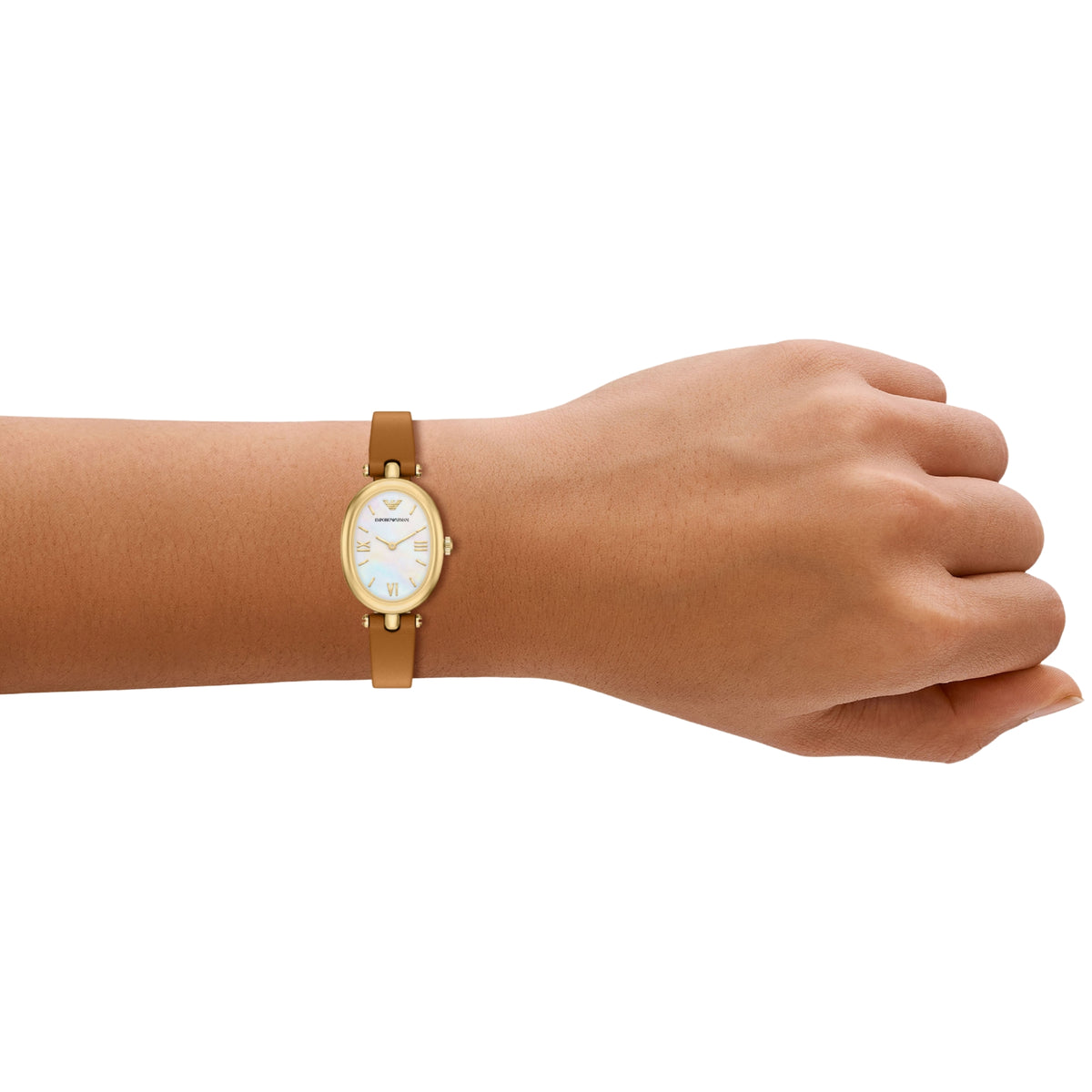 On-wrist perspective of the Emporio Armani Sinfonia AR11780 timepiece showcasing the slender tan leather band and oval white mother of pearl dial