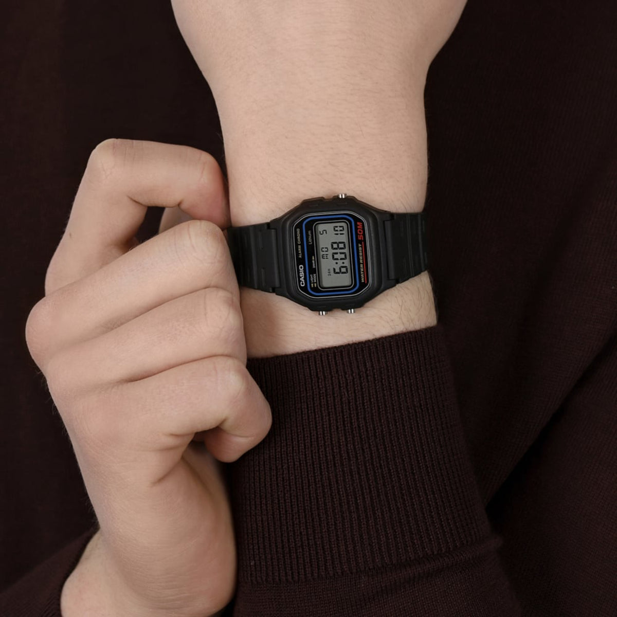 Casio Timeless W-59-1VQES close-up lifestyle view of watch model worn on wrist