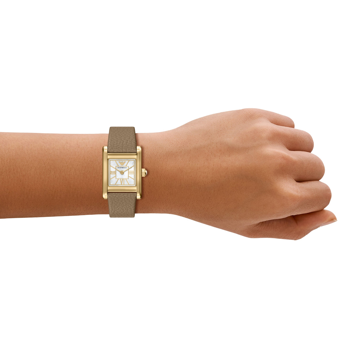 Ladies watch on wrist: taupe leather band, rectangular mother-of-pearl dial, gold case