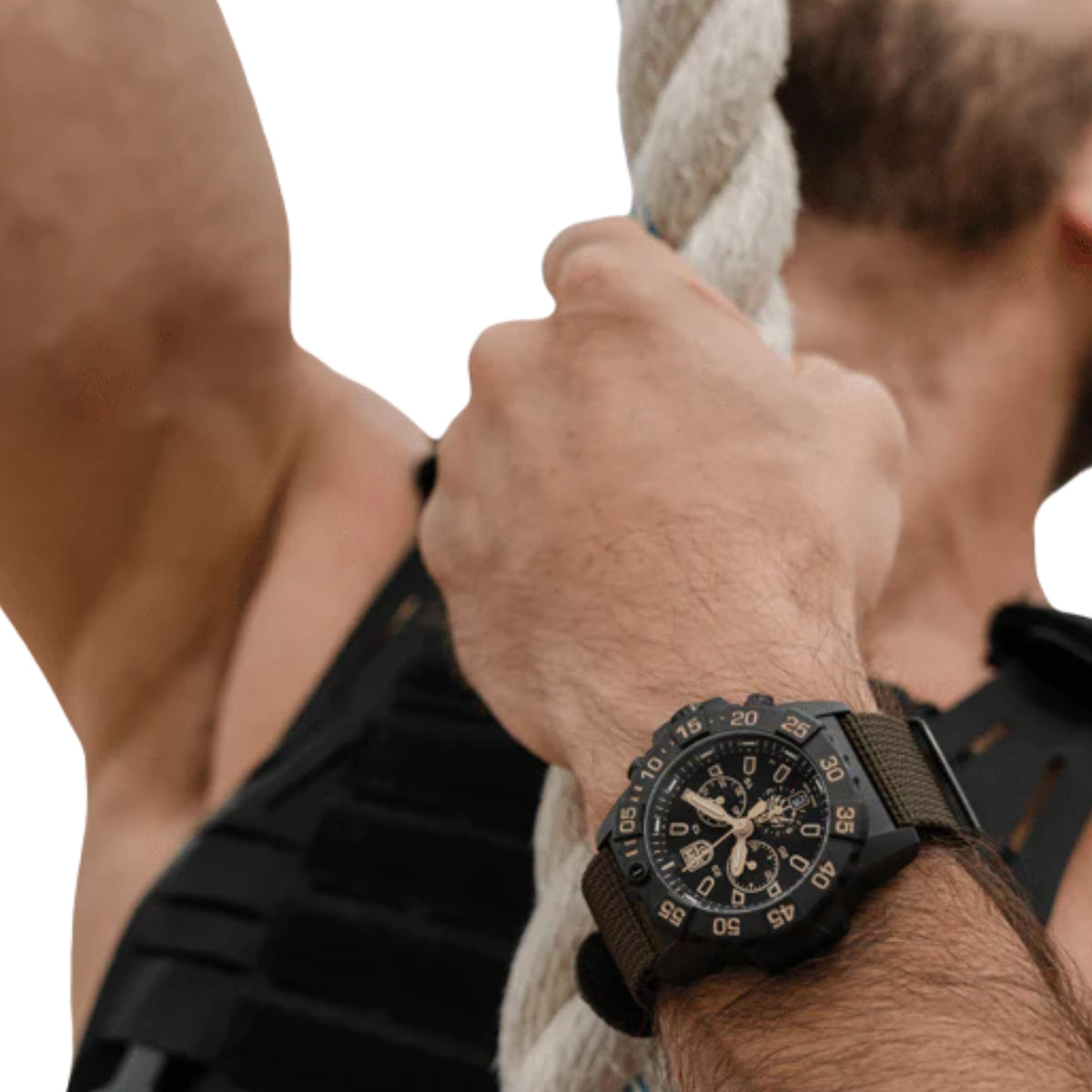 Men's black chronograph watch on rubber strap, dial and bezel detail