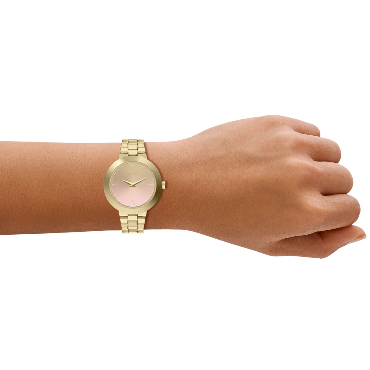 Gold-tone stainless steel ladies watch with pink dial and link bracelet on wrist