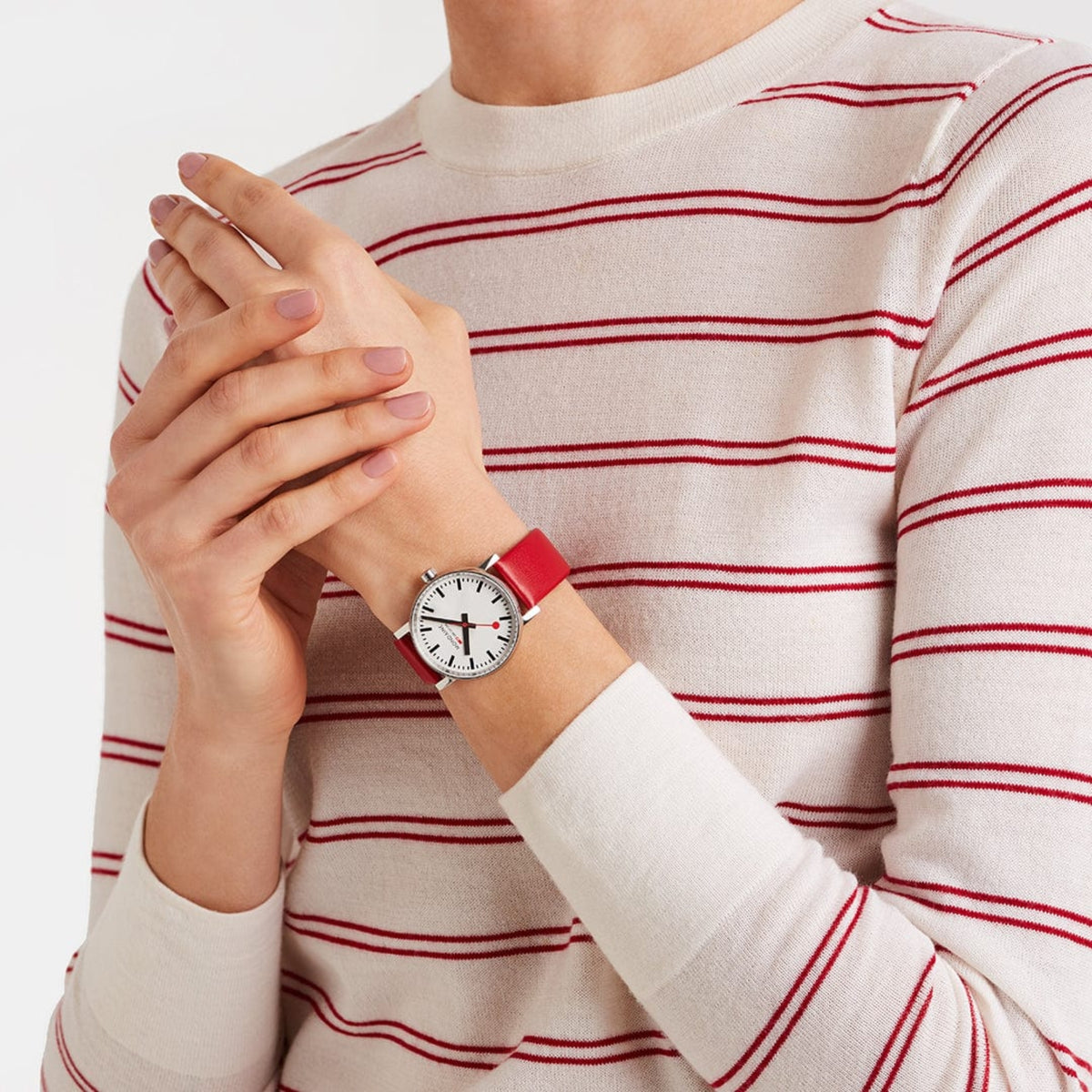 Mondaine Evo2 MSE.35110.LCV styled on wrist with striped long-sleeve top
