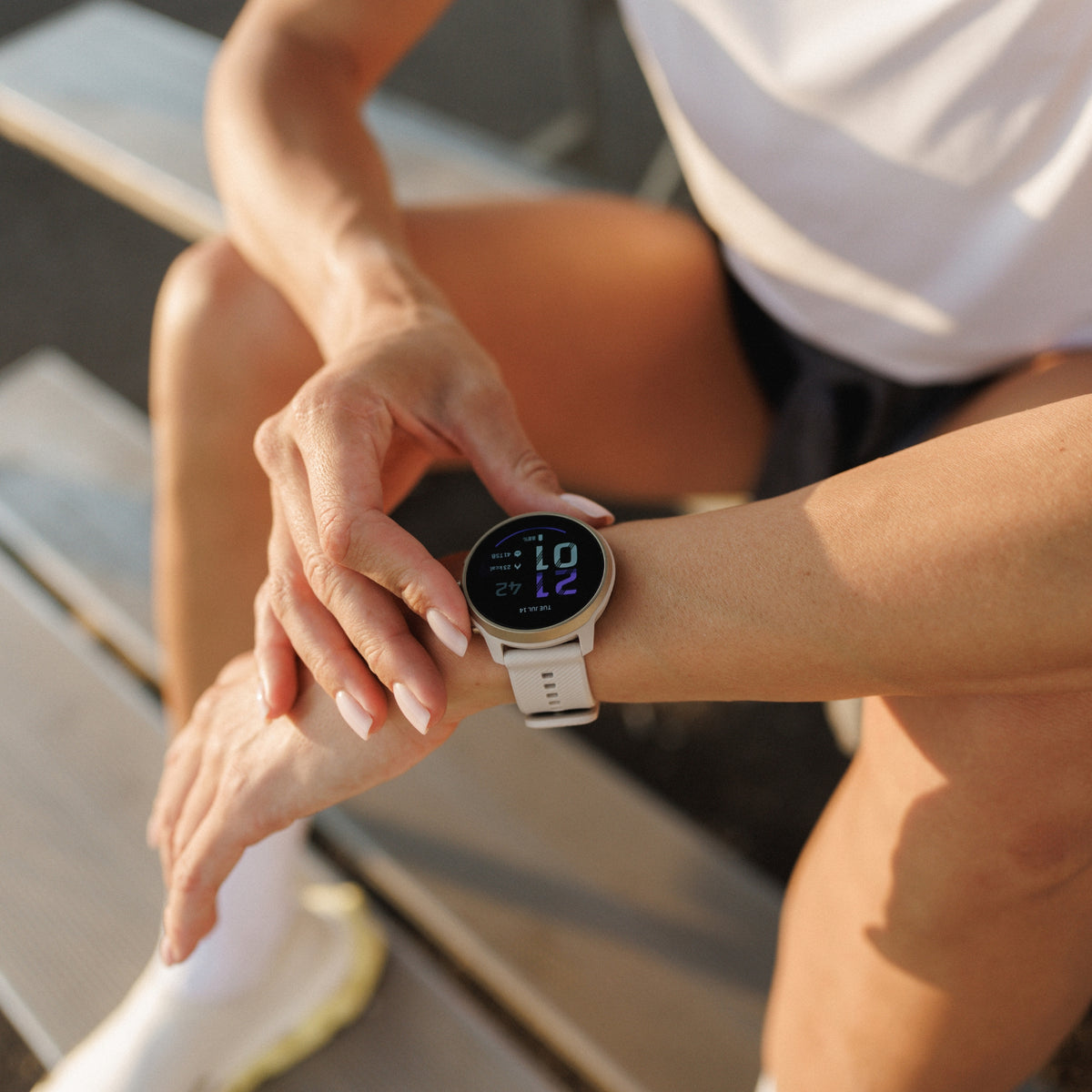 Suunto Run 2 SS051724000 top view of digital smartwatch on wrist during outdoor workout