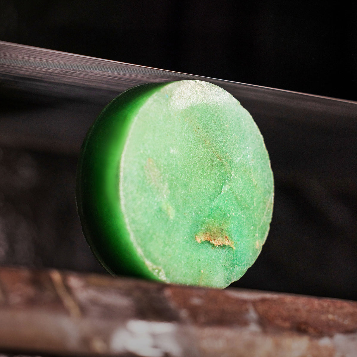 Nivada Grenchen F77 68055A77 close-up view of polished jade disc before dial assembly