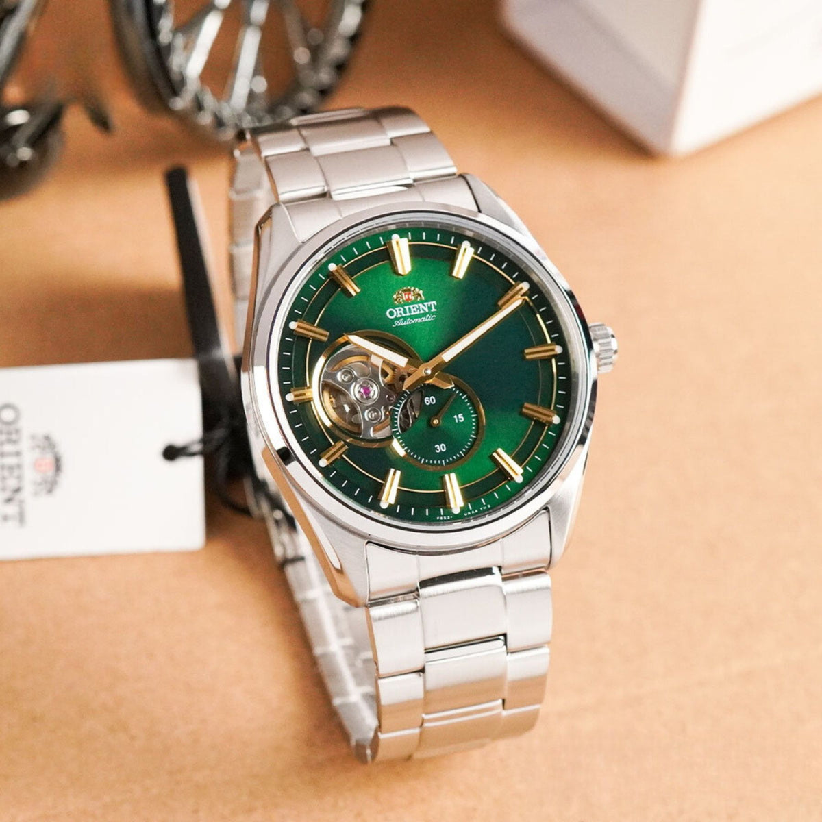 Angle view displaying the green dial design and stainless steel link bracelet of the Orient steel mens automatic Watch RA-AR0008E30B