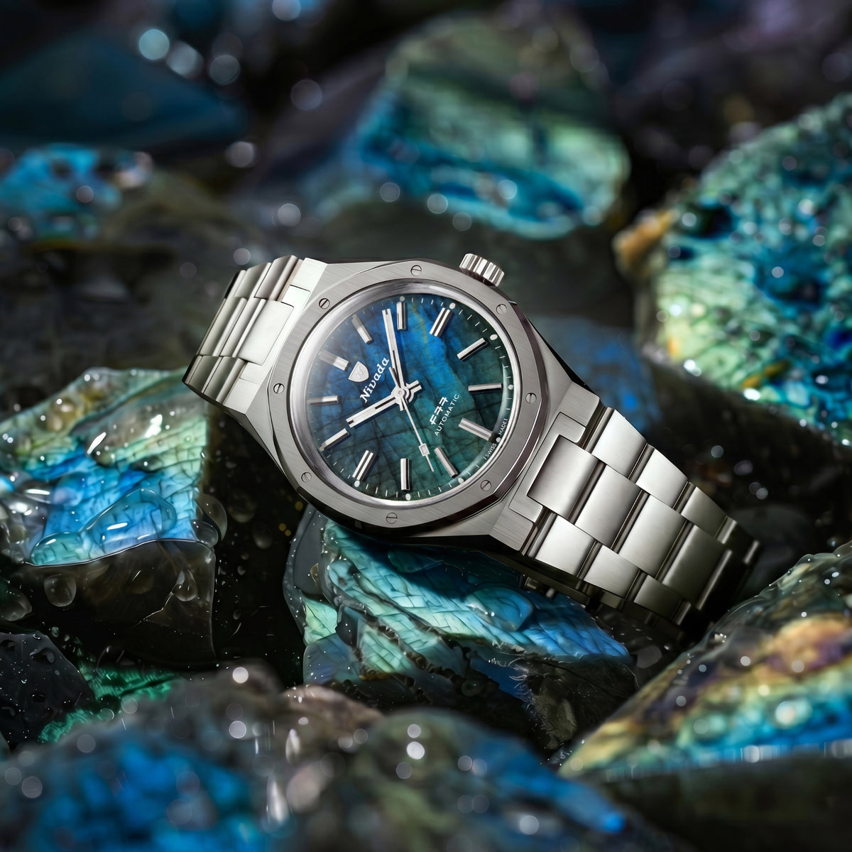 Nivada Grenchen F77 68054A77 angled shot resting on rough labradorite stone background