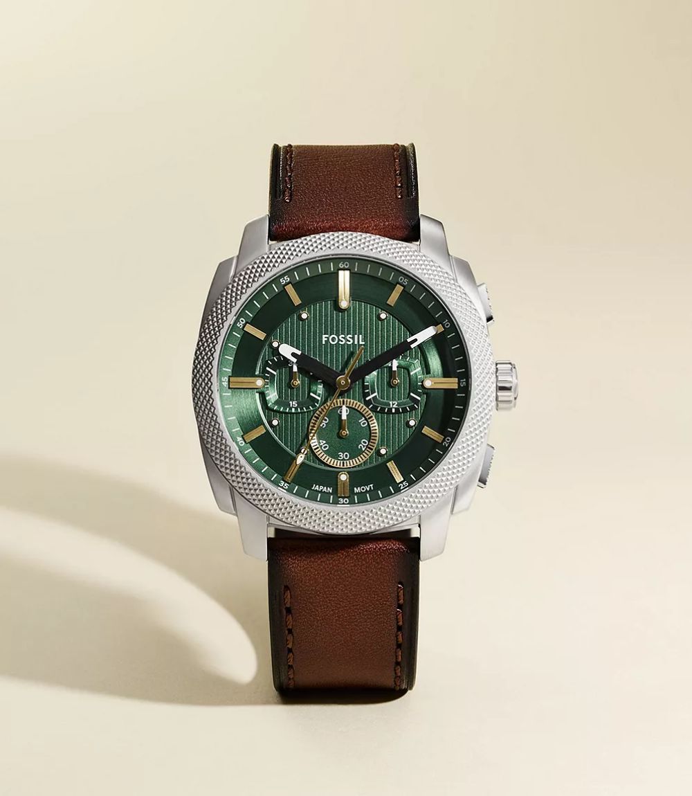 Fossil Everett mens green chronograph watch showing textured green dial, brown leather strap, and knurled steel bezel
