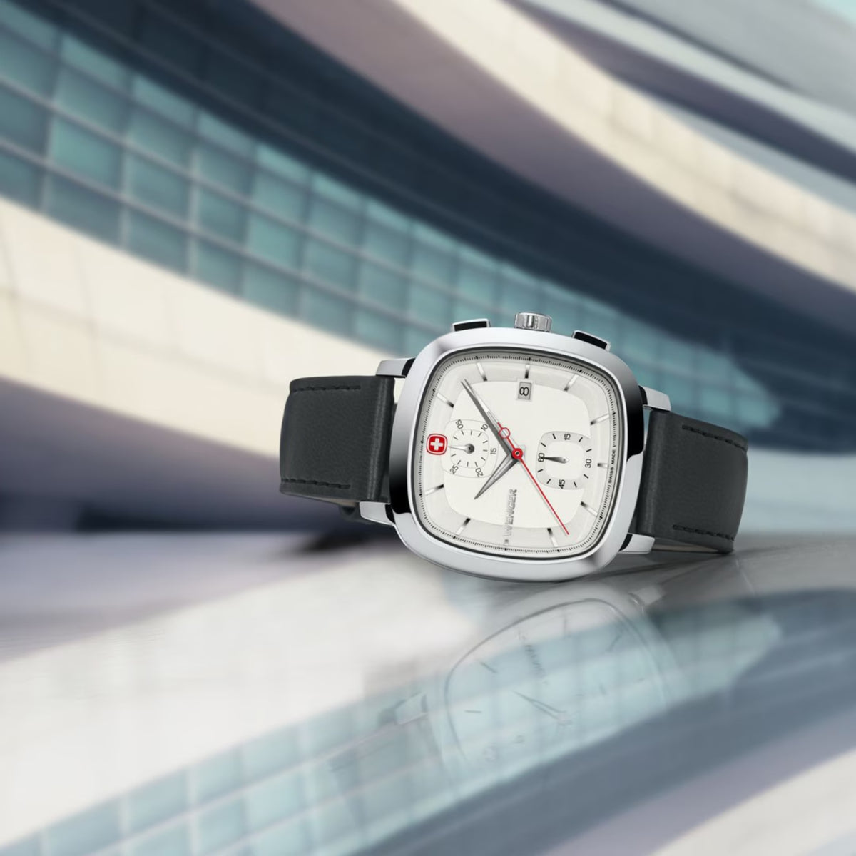 Wenger Vintage Classic 01.1933.104 angled perspective view displaying cushion white dial face and leather strap
