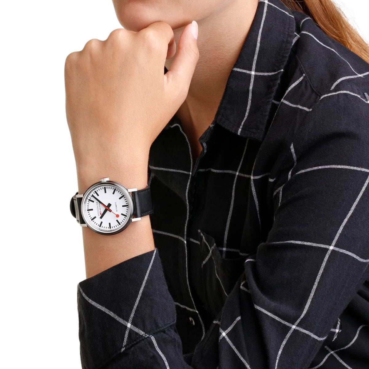 Mondaine The Original MST.4161B.LBV 41mm wristwatch styled on a woman's wrist wearing a windowpane plaid shirt