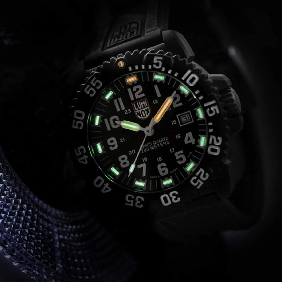 Black dial Luminox-style quartz dive watch with rubber strap and green lume markers