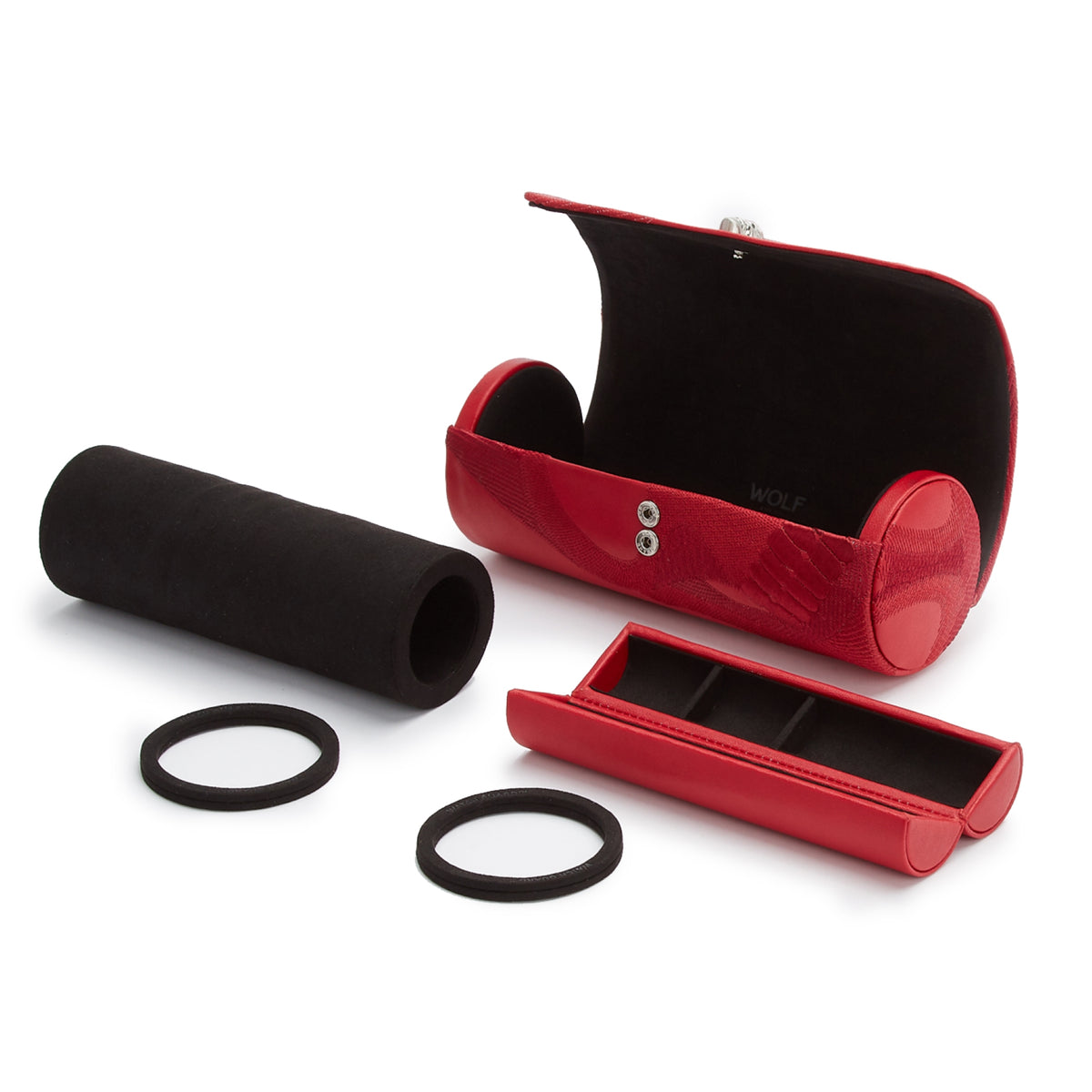 Red triple watch roll open with two watch cushions, loose inner pieces, and black elastic bands.