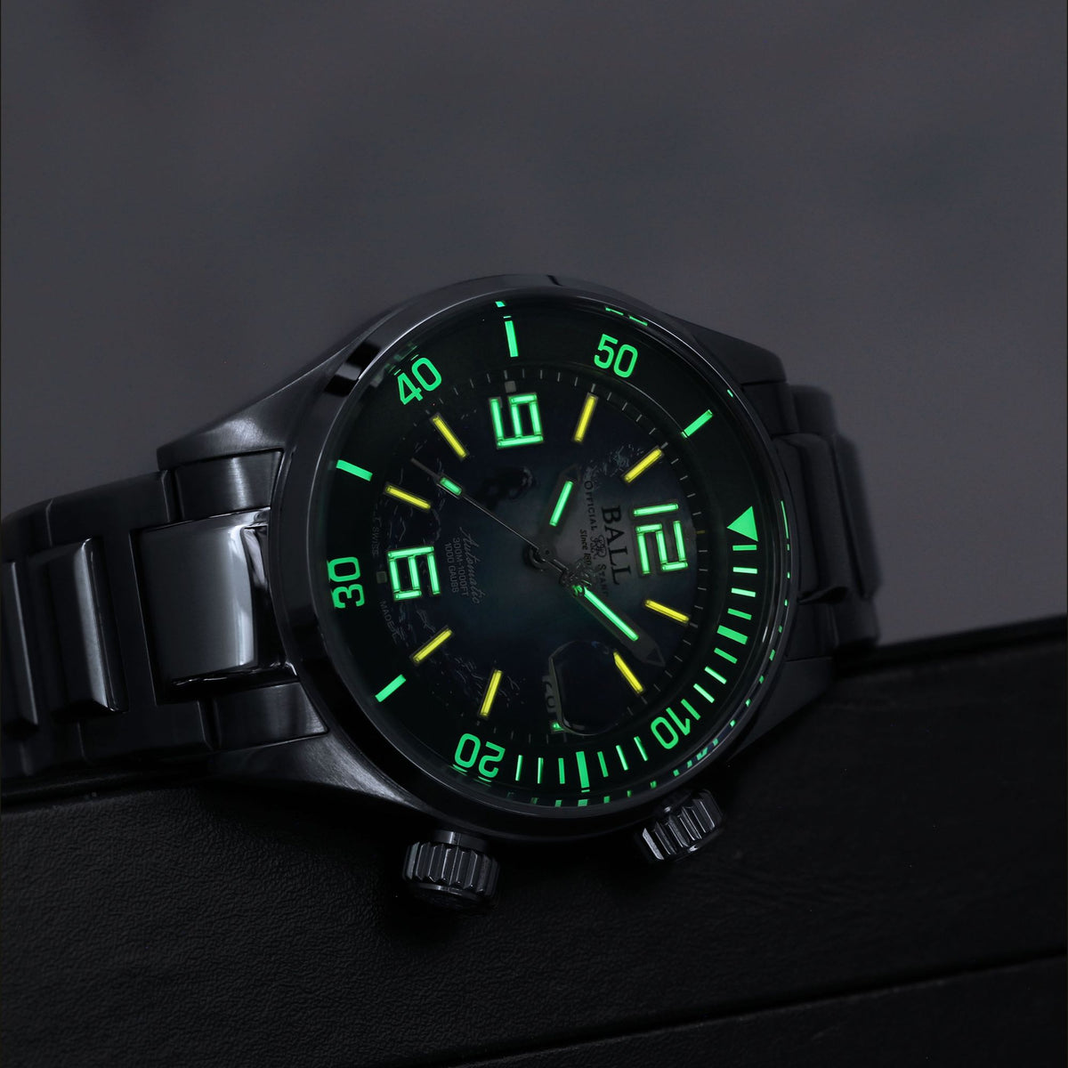 Angled view of BALL Engineer Master II Diver black steel watch highlighting luminous indices and robust case design