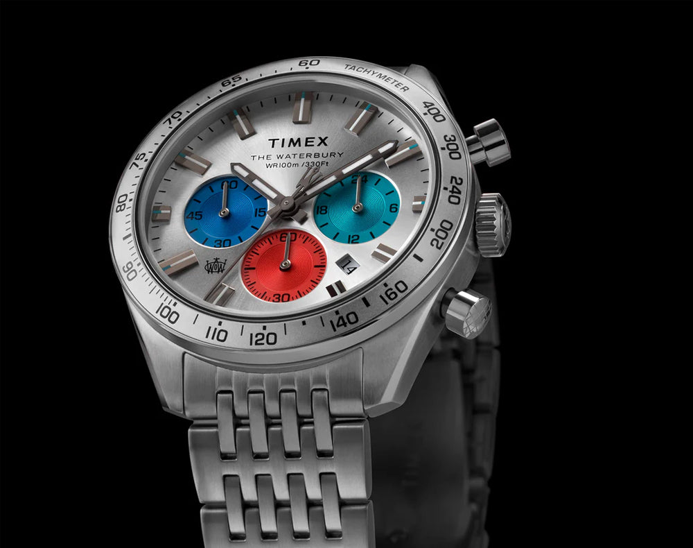 Timex The Waterbury stainless steel chronograph watch featuring silver dial with blue and red sub-dials