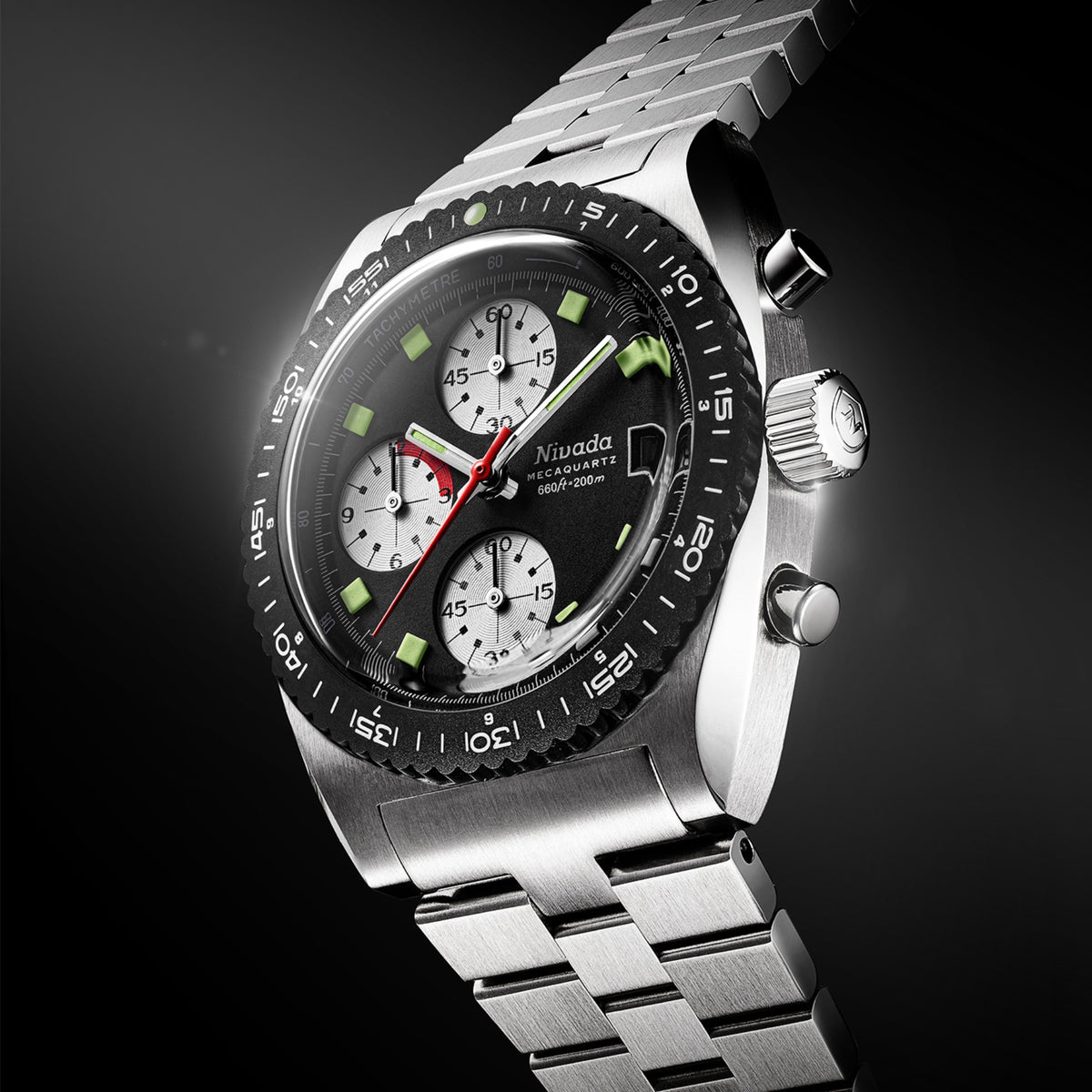 Side view of Nivada Grenchen Autochron stainless steel chronograph watch 77007Q45 with black dial, green lume markers, and red second hand