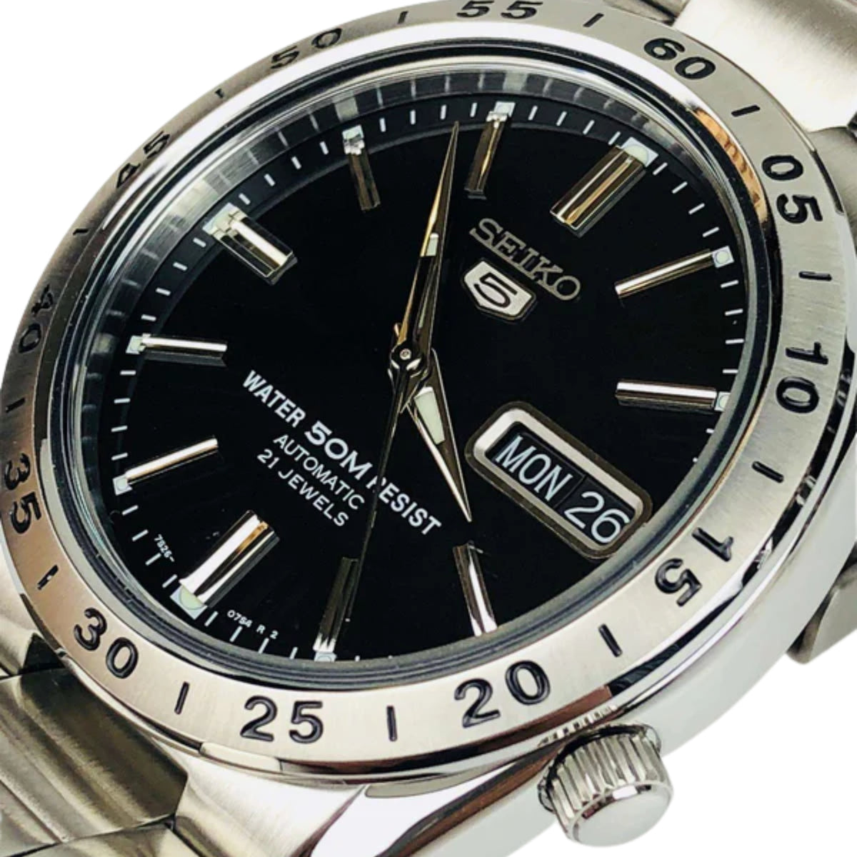 Seiko 5 men's automatic watch close-up of black dial, gold markers, date window