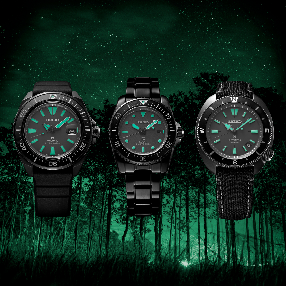 Three black Seiko diver watches with green dials and different straps, rotating bezels