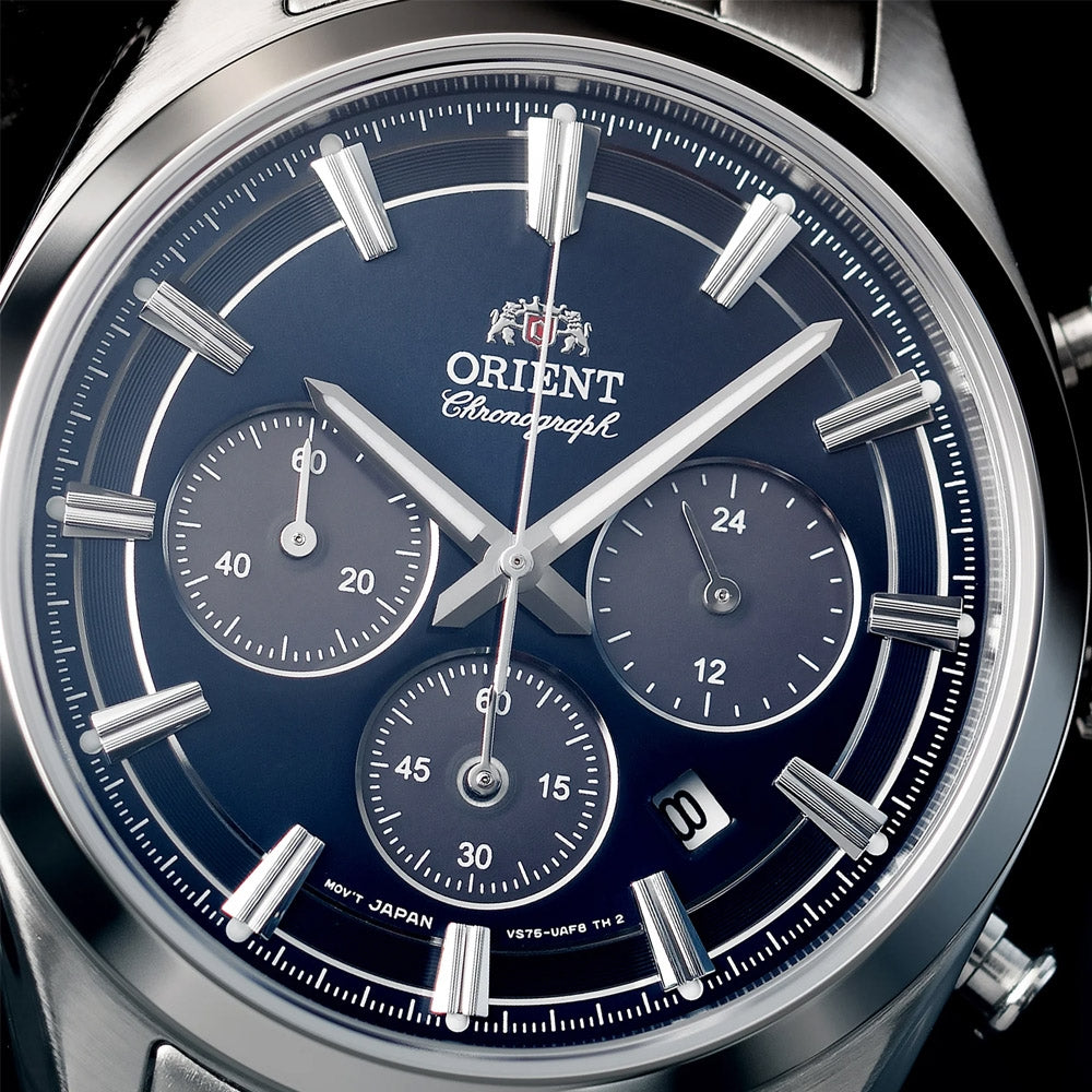 Navy chronograph watch dial with baton markers, three subdials, and Orient branding