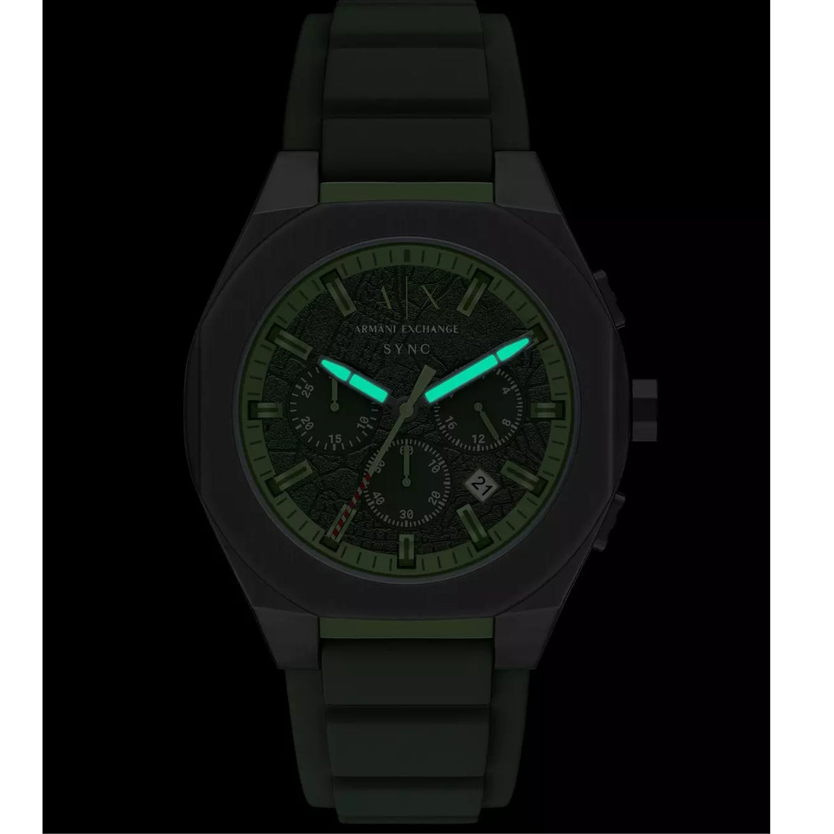 Armani Exchange Sync AX4292 mens quartz watch with luminous green hands and markers glowing in the dark
