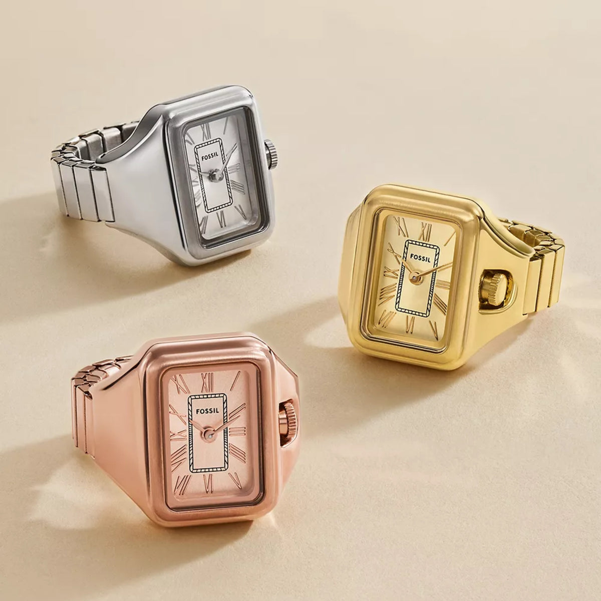 Fossil Raquel ES5345 group view featuring rose gold dial model alongside silver and gold quartz ring watches