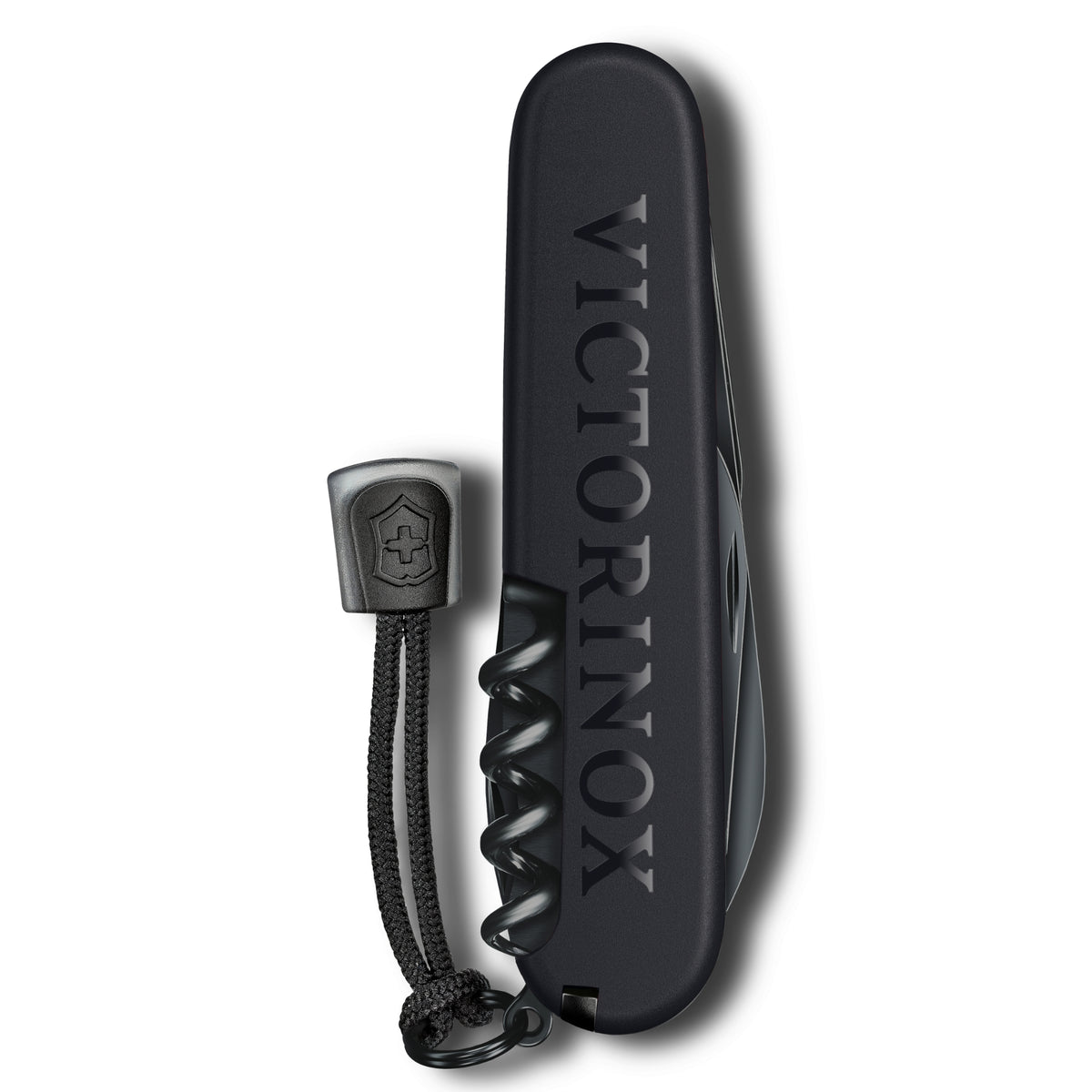 Close-up of black Victorinox multi-tool knife showing "VICTORINOX" branding, corkscrew and key ring attachment