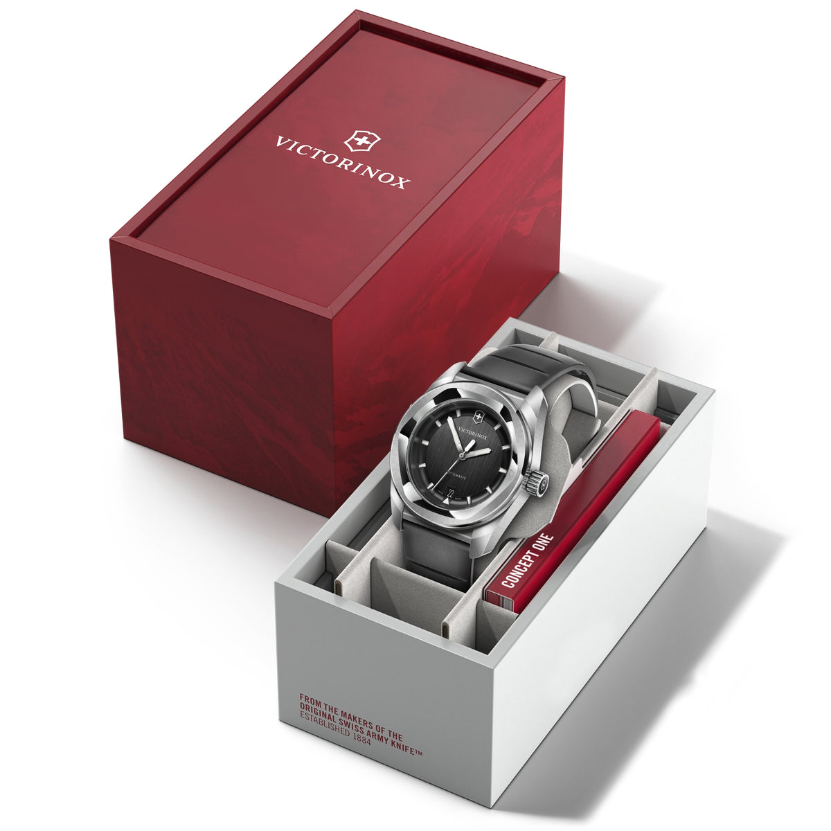 Automatic wristwatch in open display box with black dial and black rubber strap