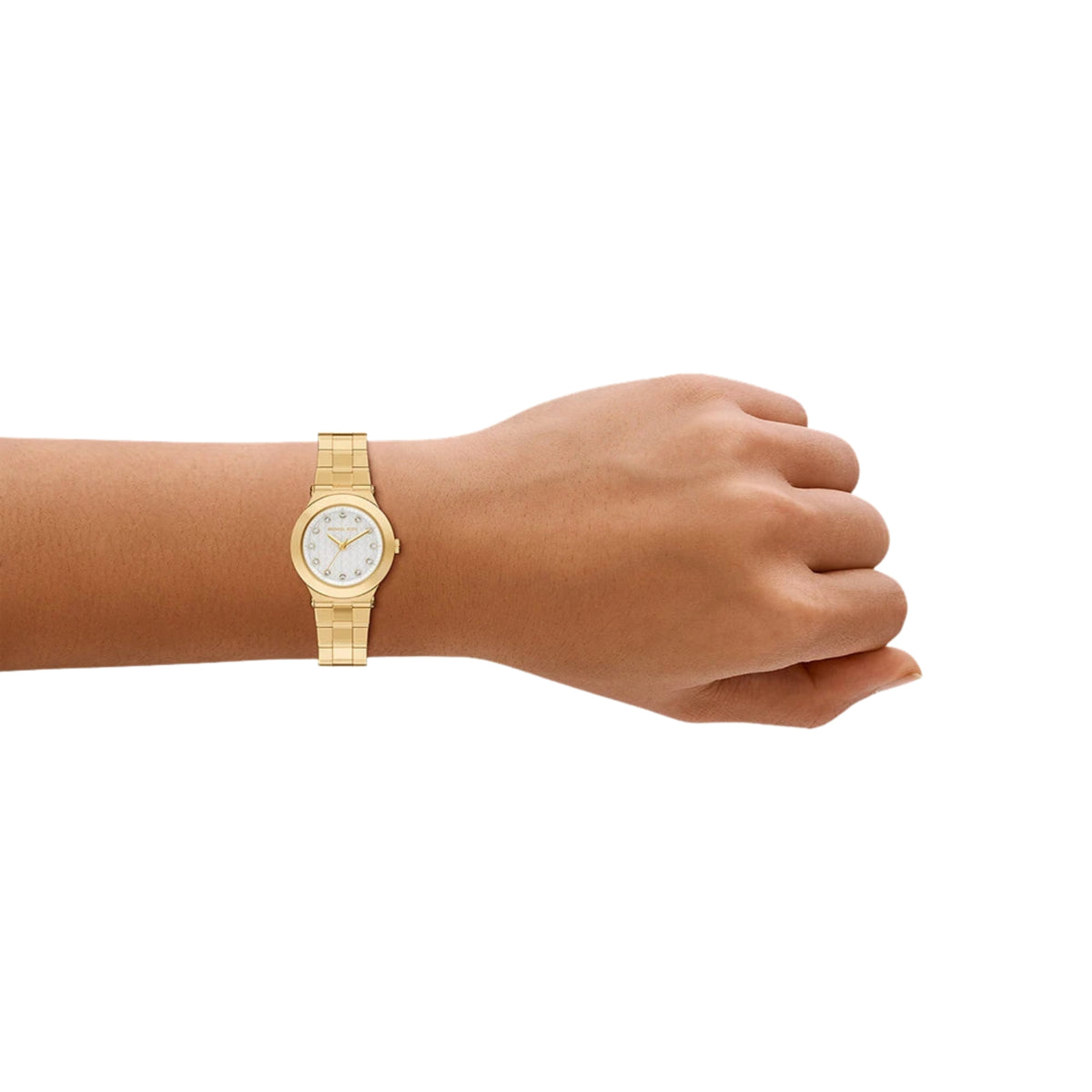 Michael Kors Billie MK7567 womens watch styled on a wrist, displaying the white mother of pearl dial and slim gold-tone link bracelet