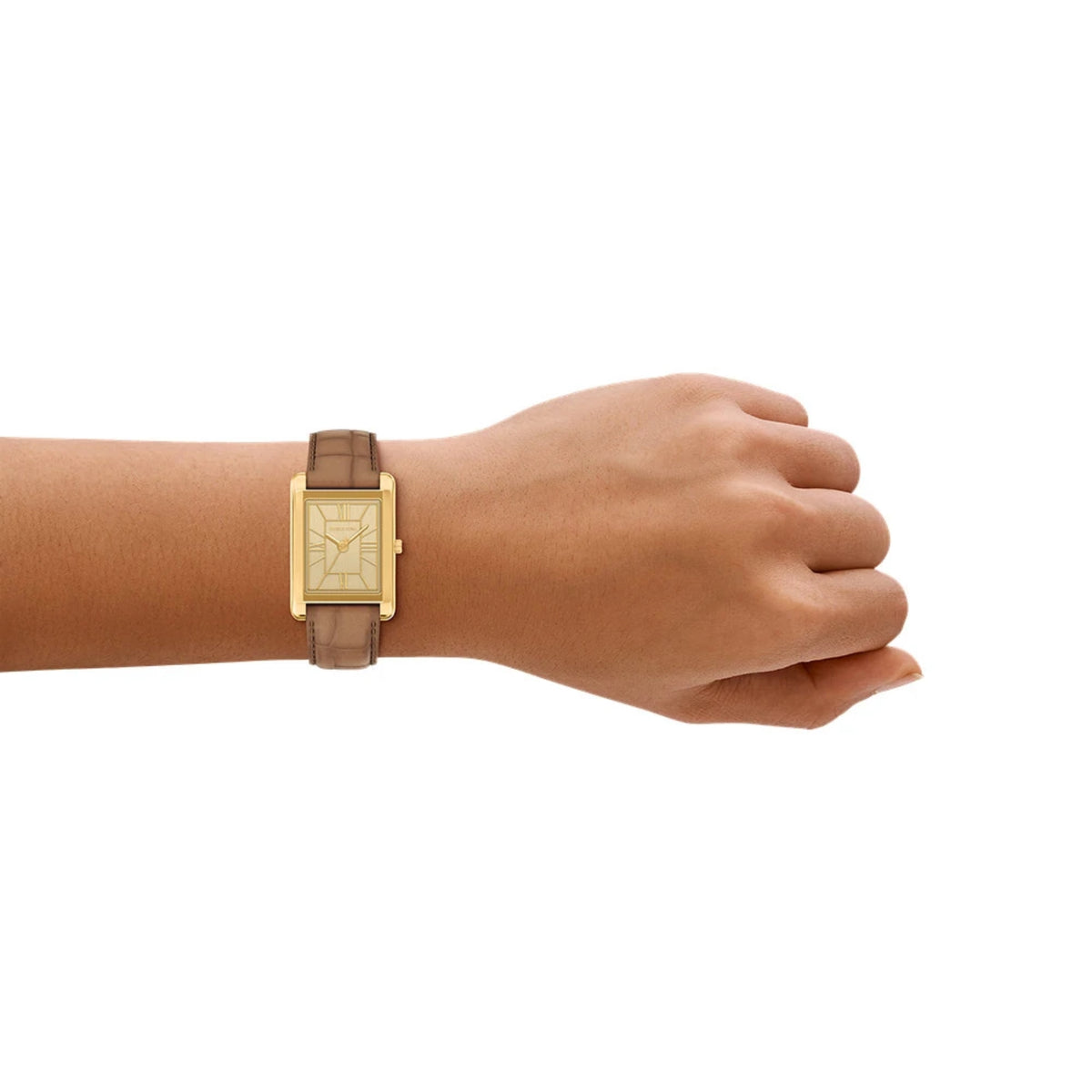 Michael Kors Essex MK7584 womens watch styled on a wrist, displaying the gold dial, rectangular case, and brown leather strap