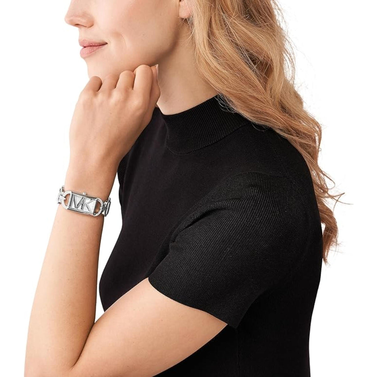 Michael Kors Empire MK7407 ladies quartz watch model shot view showing the silver-toned chain timepiece on a wrist