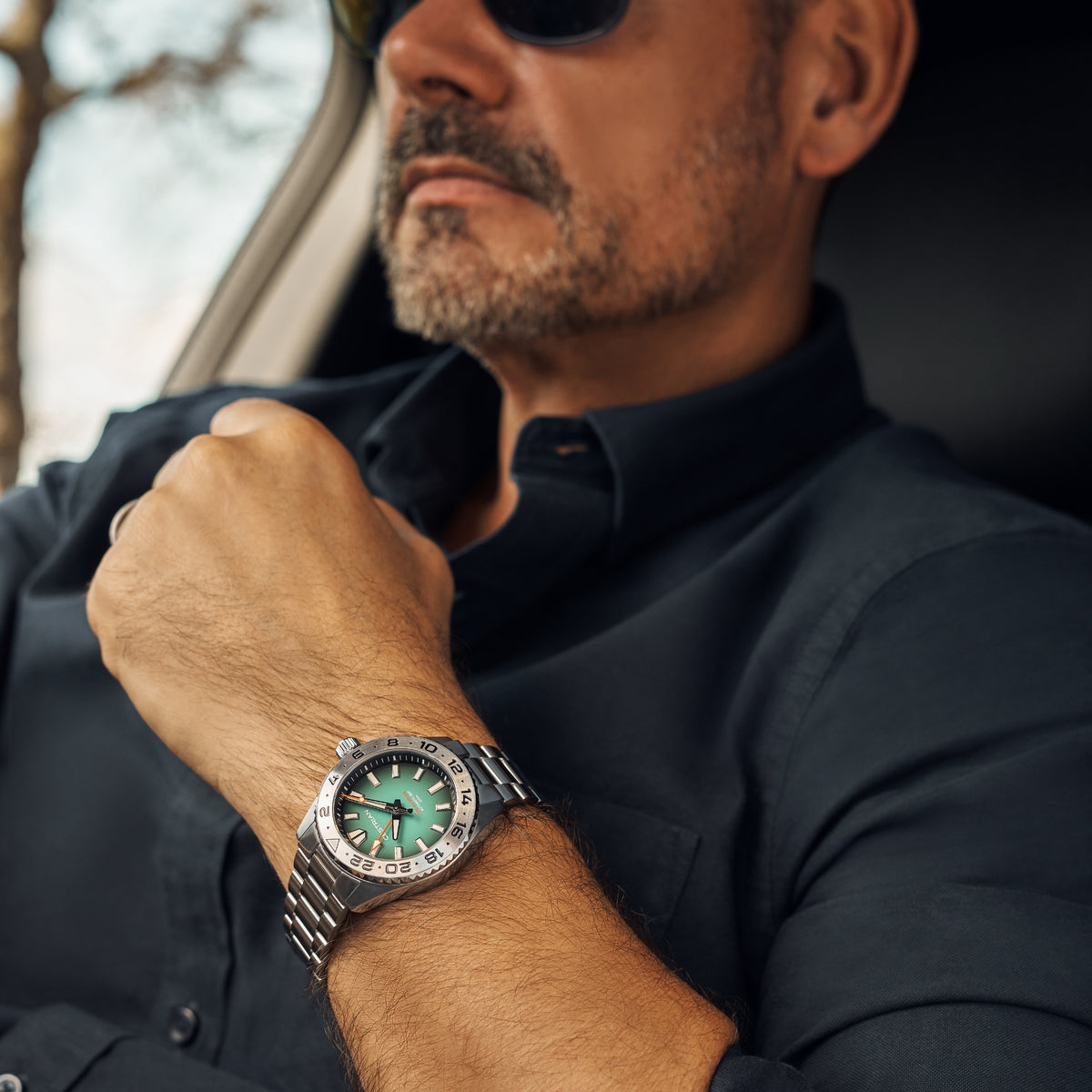 Cestrian Ocean Series GMT watch with green dial and steel bracelet on wrist