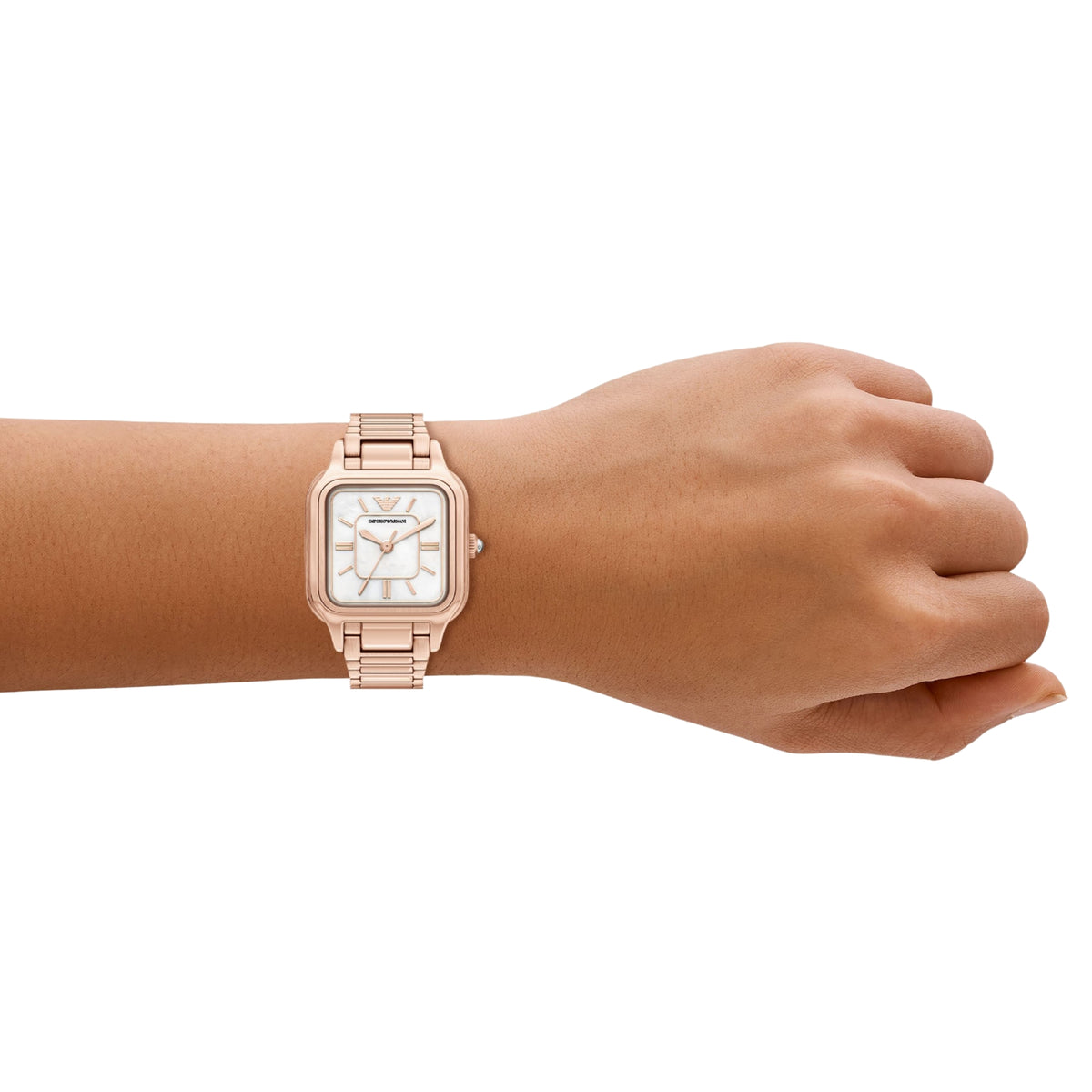 Ladies rose-gold tone quartz watch on wrist with mother-of-pearl dial