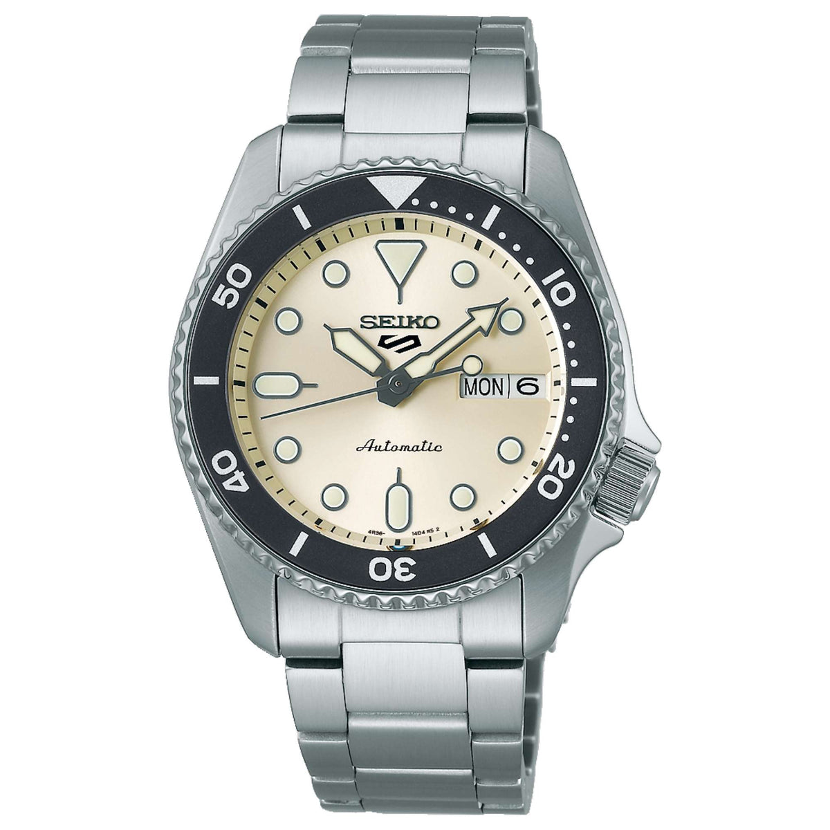 Seiko steel bracelet watch with cream dial, black bezel, and day/date MON 6