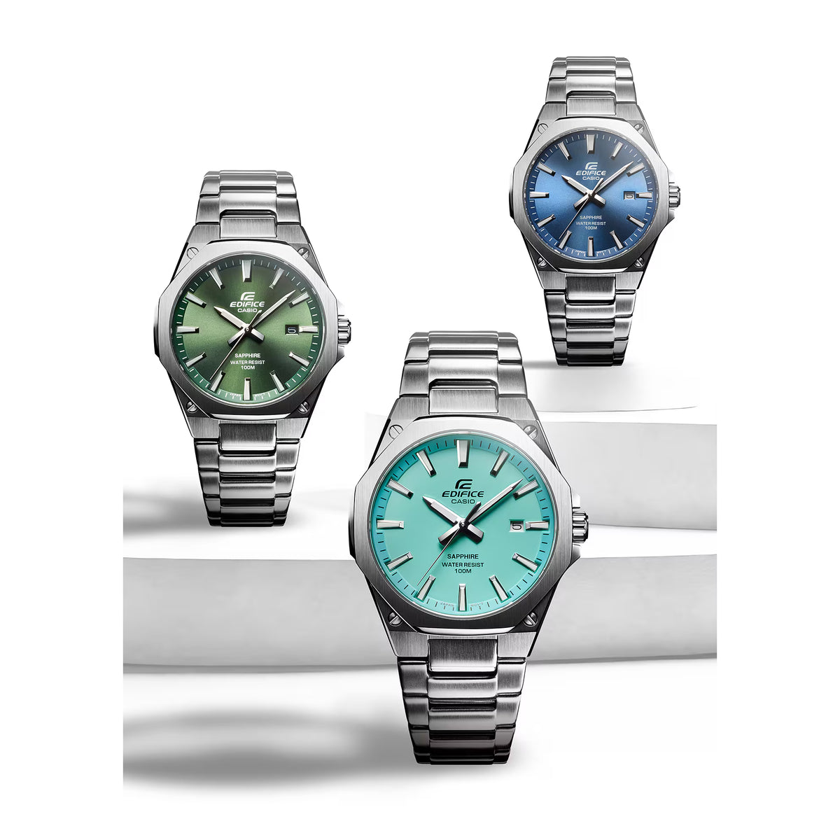 Studio display featuring the Casio Edifice EFR-S108D-3AVUEF green dial watch alongside blue and turquoise editions