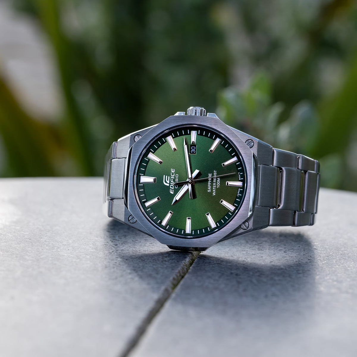 Close-up product shot of the Casio Edifice EFR-S108D-3AVUEF steel watch displaying its sunray green dial