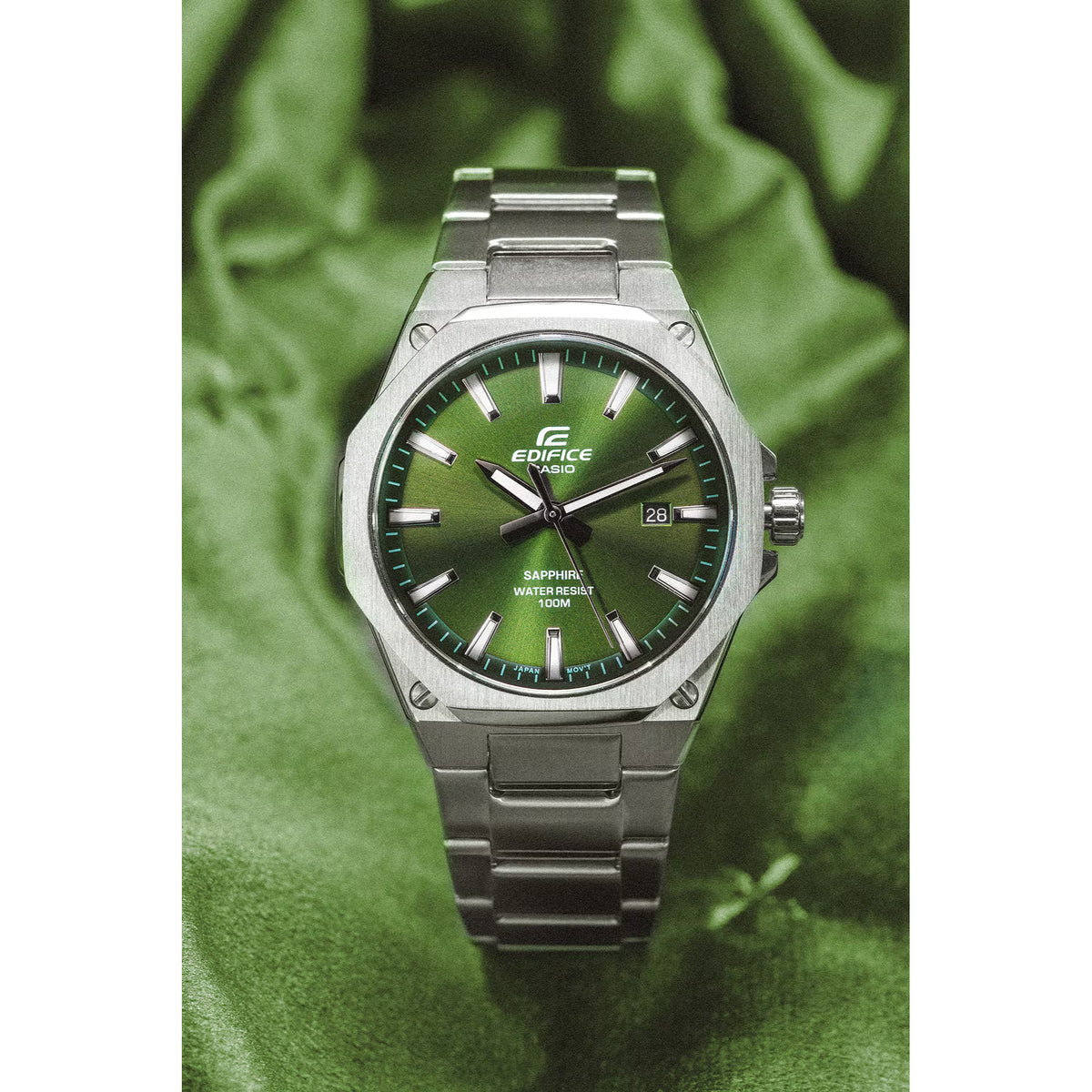 Flat lay view of the Casio Edifice EFR-S108D-3AVUEF analogue watch resting on textured green fabric