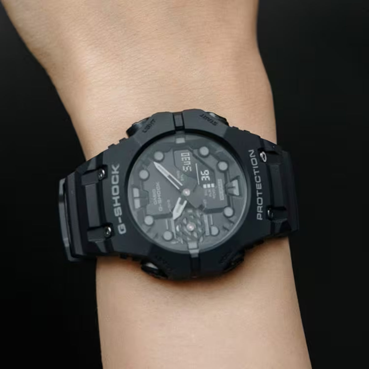 Casio G-Shock GA-B001-1AER lifestyle shot featuring a black dial display watch worn on the wrist