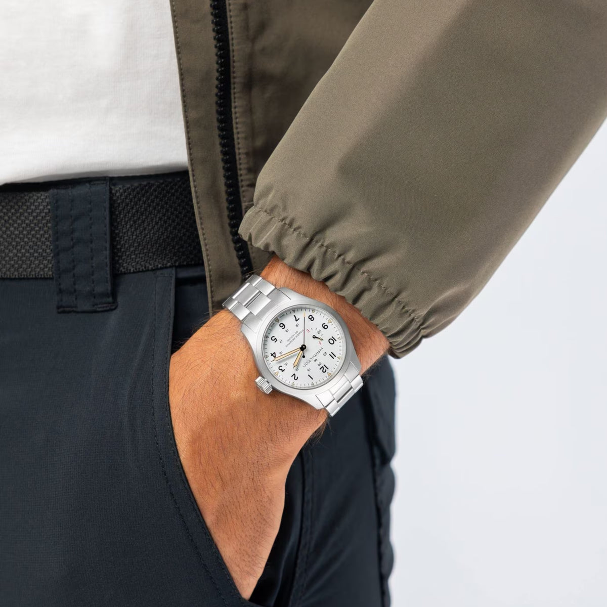 Hamilton Khaki Field H69509110 mens mechanical watch worn on wrist showing white dial, stainless steel case, and bracelet