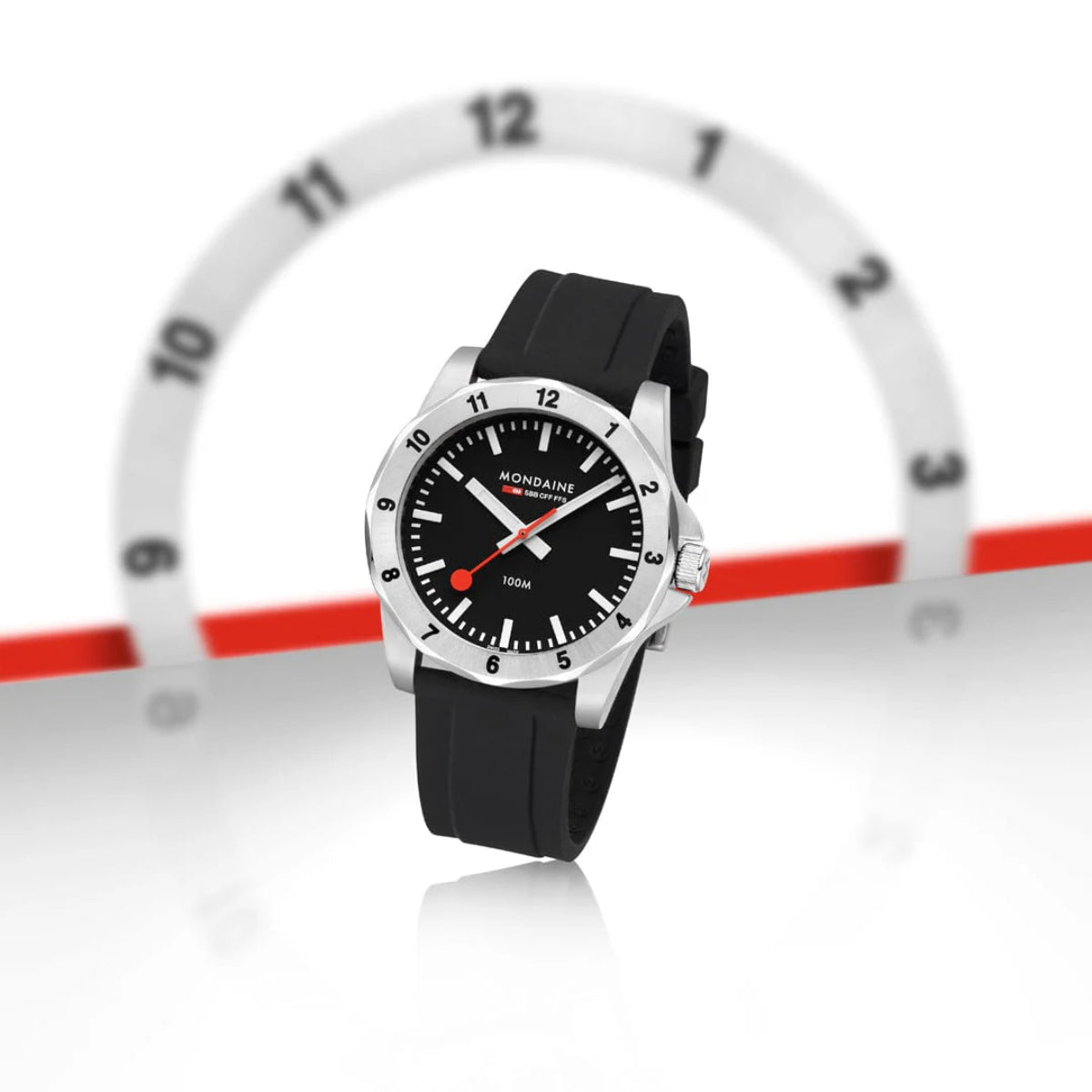 Mens quartz wristwatch with black dial, black silicone strap, silver case, numeral markers