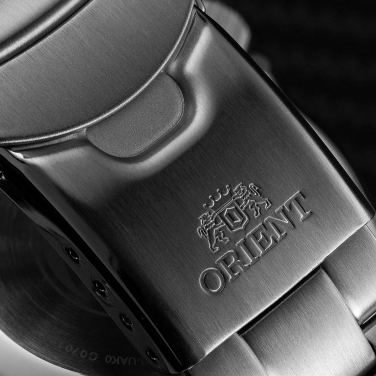 Steel bracelet clasp with engraved Orient Triton logo